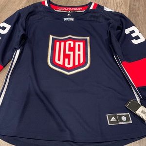 Womens hockey Jersey size is large and x large